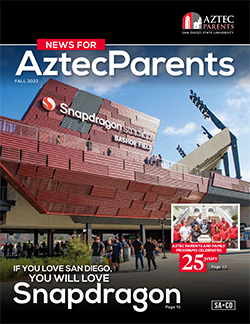 cover photo of news for aztec parents magazine with photo of students talking on steps