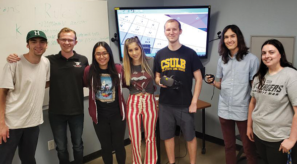 Recent graduate Carter Andrews says joining student clubs (above right: VR Club officers, photo taken prior to COVID-19) and organizations provides an edge in the job market.