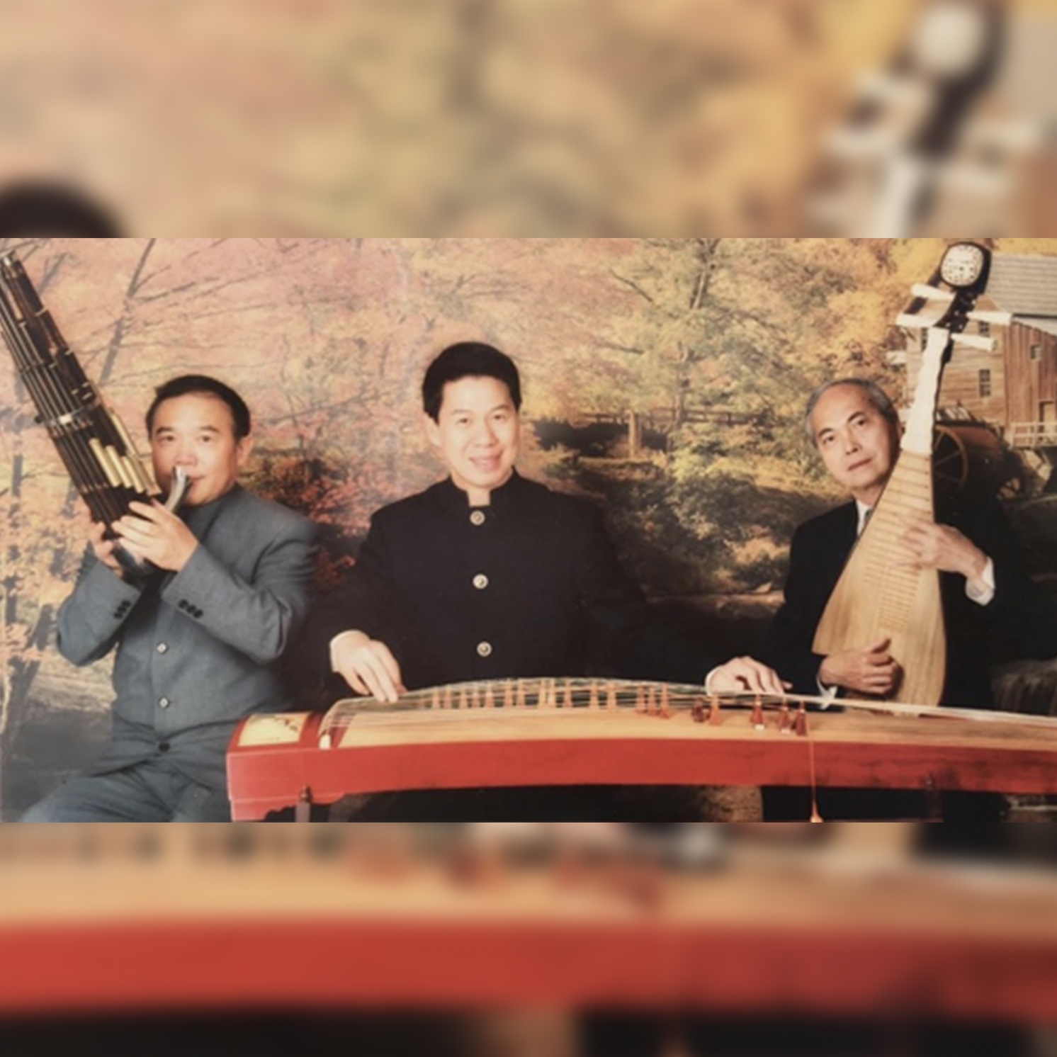 Asian men playing instruments