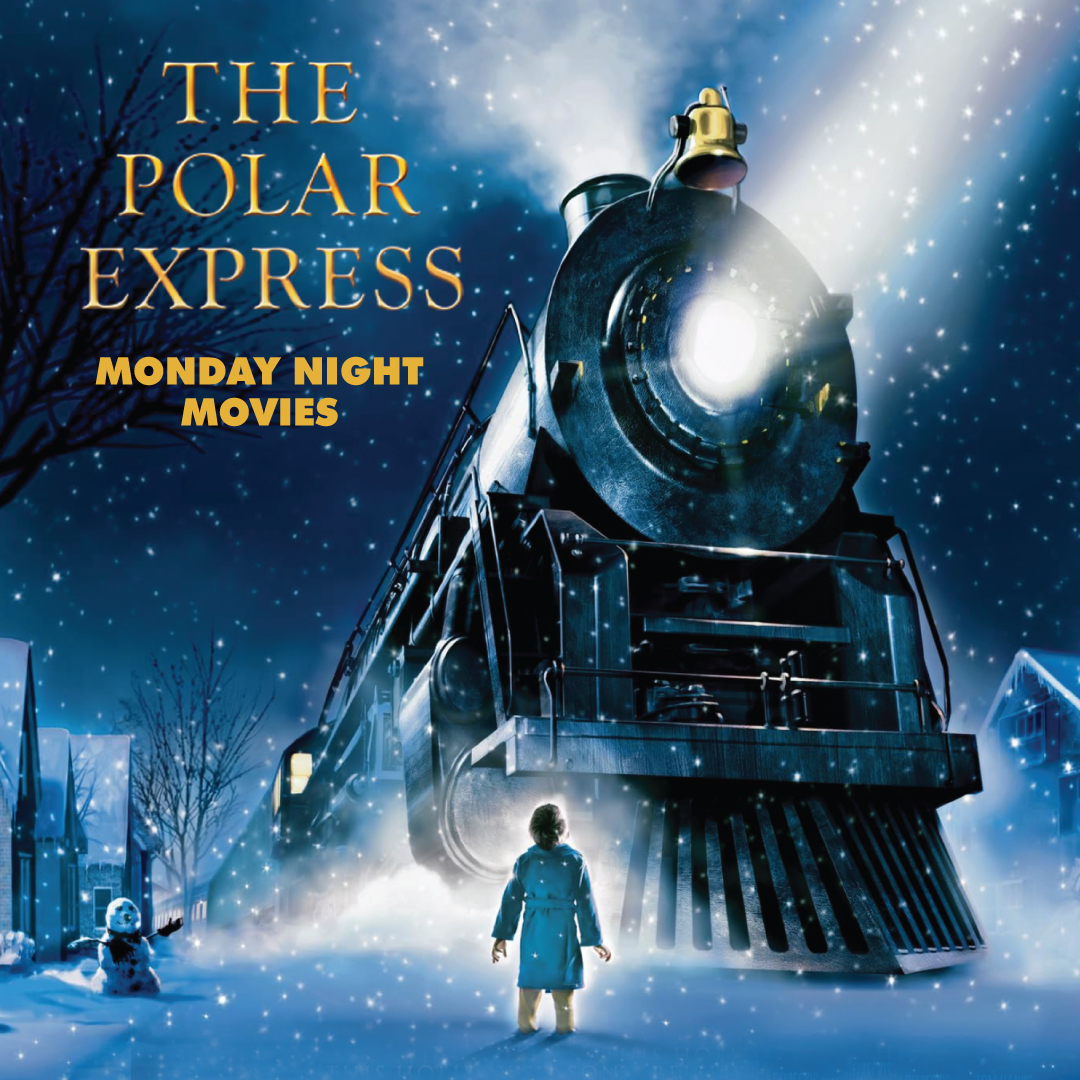 snow with Polar Express train with person and snowman standing nearby