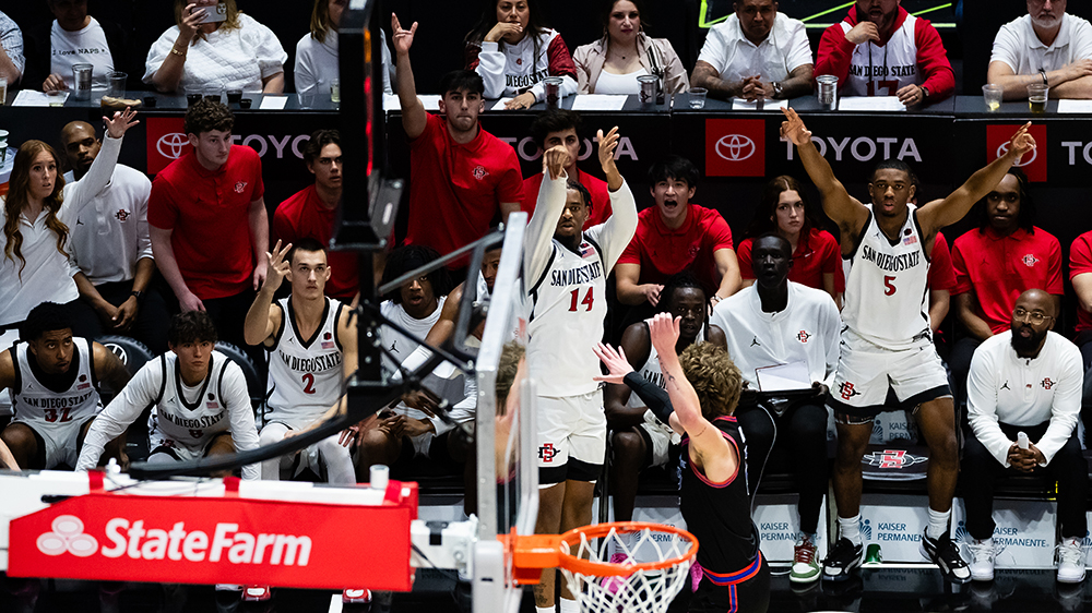 basketball player shooting a basketball