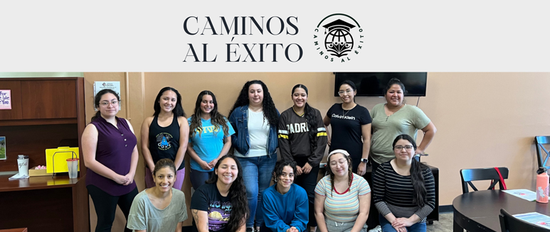 twelve individuals standing and kneeling, with caminos al exito logo at the top of banner