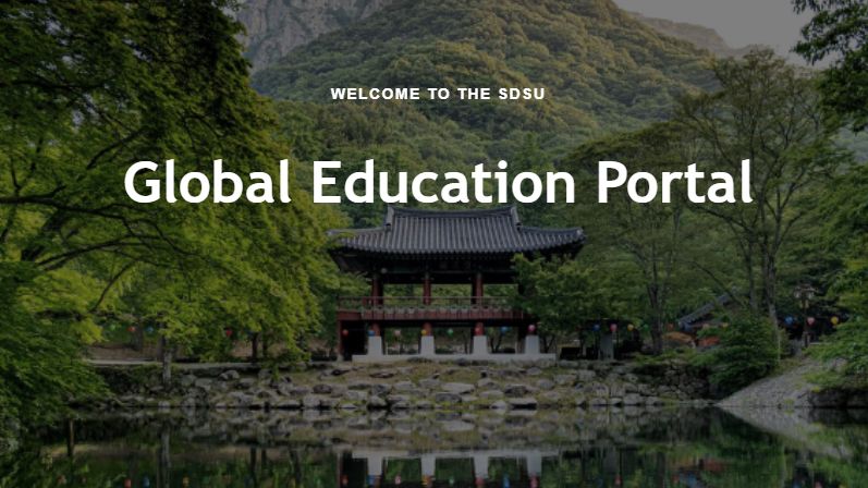 green landscape and reflective water with text saying Global Education Portal