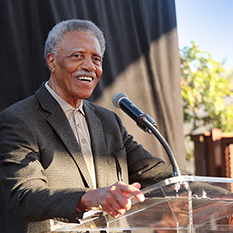 photo of harold k brown speaking at podium