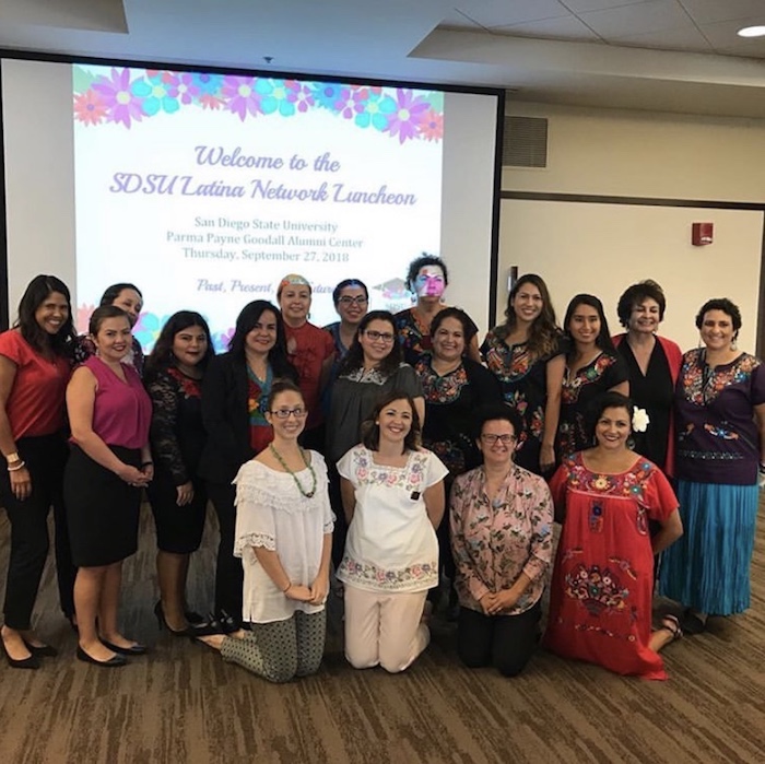 group photo of erg members at latina network luncheon